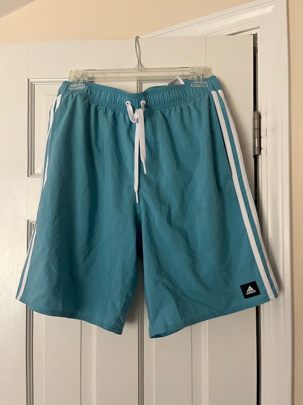 adidas aqua blue swim trunks with white trim